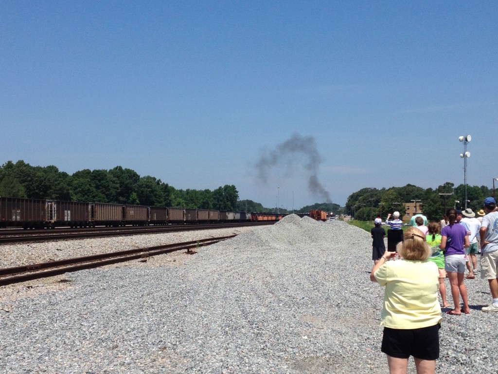 Norfolk & Western No. 611 approaches in the distance in Crewe, Virginia